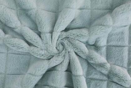 Why should coral fleece be stored in a cool and dry place